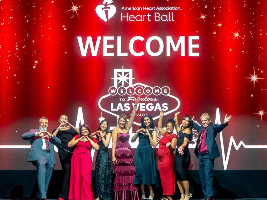 American Heart Association Heart Ball team and supporters on stage at the Lou Ruvo Center in Las Vegas celebrating heart health awareness and community advocacy