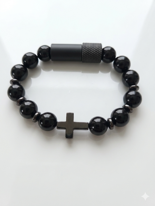 Black beaded bracelet with a cross charm on a white background